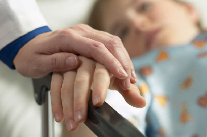 Doctor holding patient hand an 2.jpg