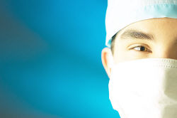 Surgeon wearing white mask 3.jpg