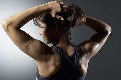 Woman with tattooed arm uid 1283764.jpg