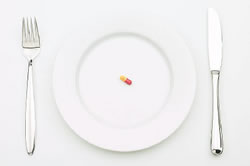 new3_Single pill on plate at place setting.jpg