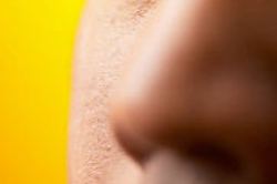 new4_Close up of half of South Asian man face against yellow backgr 3.jpg