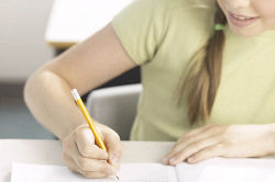 Little girl writing at her desk 8.jpg