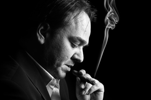 images_1Person-smoking-a-cigar-M.jpg