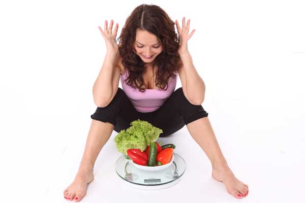 images_1632017_2_weight-weightloss-woman-veggies-diet-scales.jpg