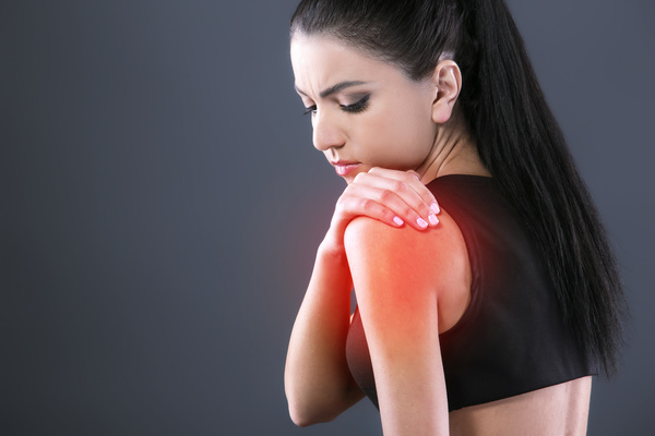 images_2332017_Shoulder-pain-woman-Stock-Photo.jpg