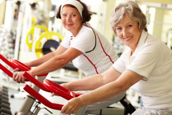 images_992017_two-women-at-gym-riding-bikes-600x400.jpg